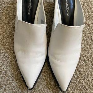 Pointed toe mules with cowboy boot heel